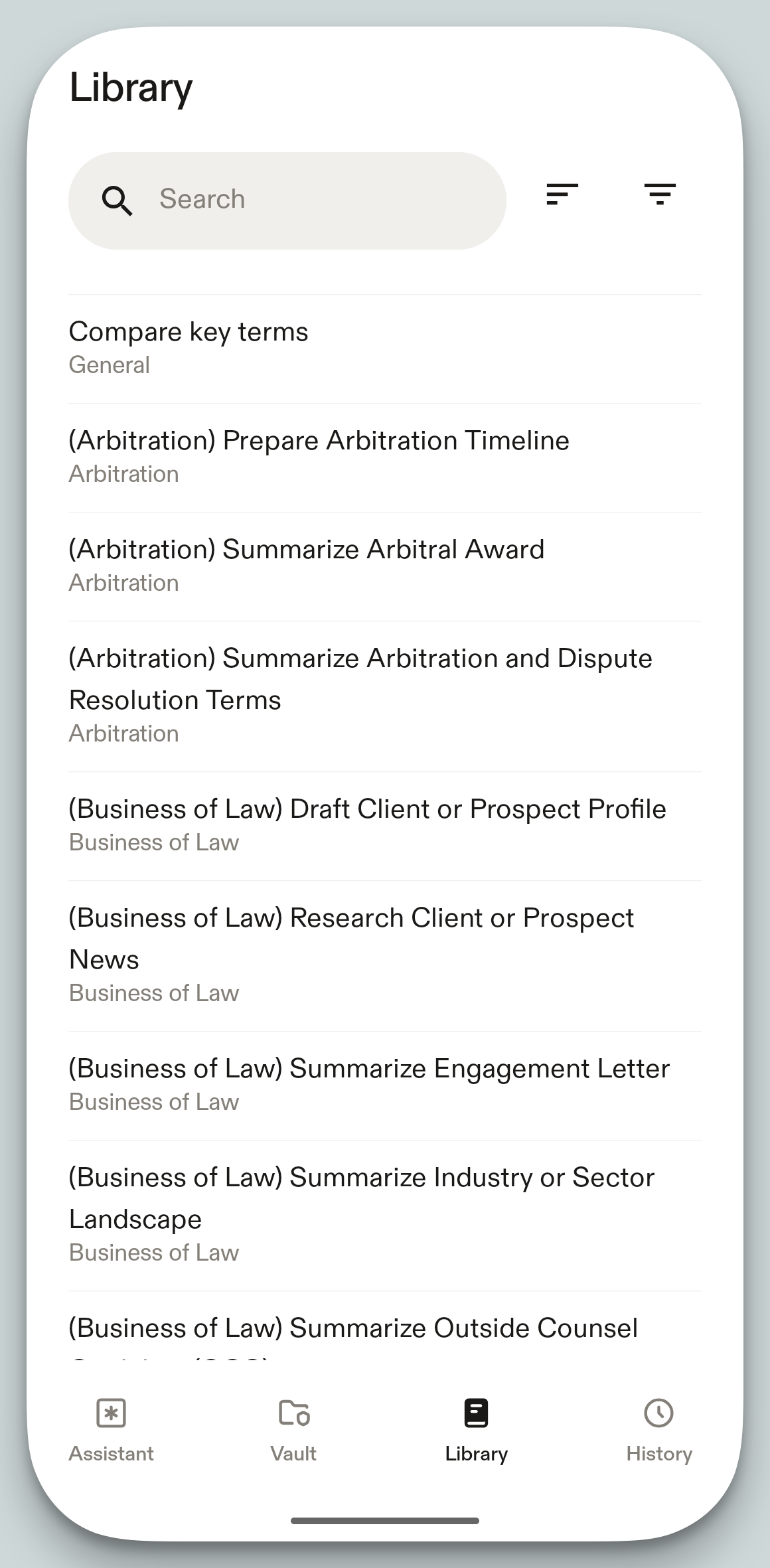 Screenshot of the Harvey app's Library screen with a search bar and sort/filter icons at top. A scrollable list of saved prompts is grouped by category, including General, Arbitration, and Business of Law entries. The Library tab is selected in the bottom navigation bar (Assistant, Vault, Library, History).