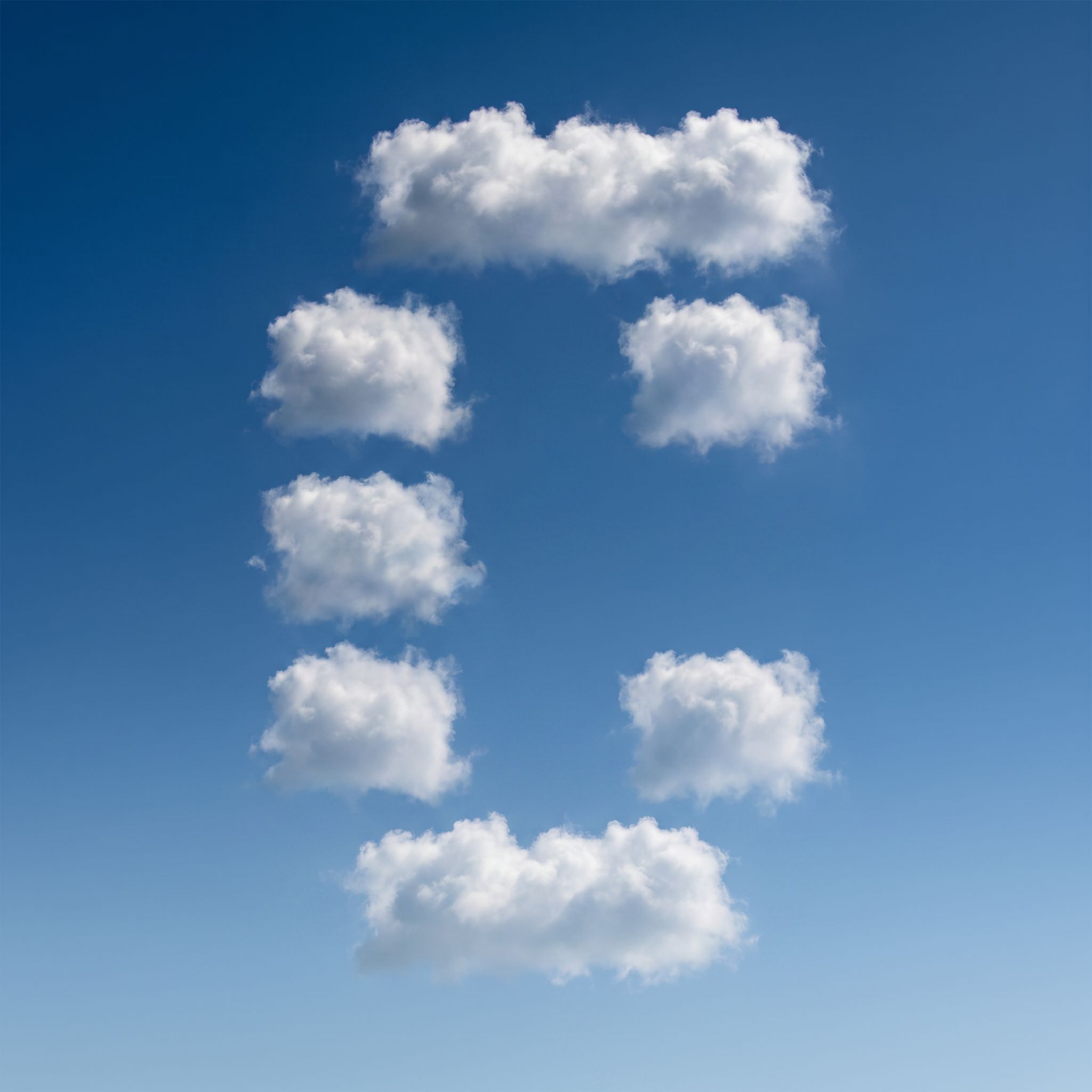 Clouds arranged in the shape of the Conductor logo against a blue sky